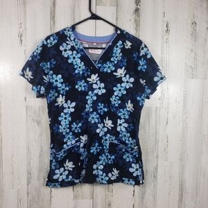 White cross blue and black flower scrub top women's size medium